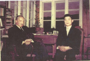 Zoom image: Kah Kyung Cho (right) with Martin Heidegger, 1957. Cho's study, 'Ecological Suggestibility in Heidegger's Later Philosophy,' first presented to the General Society of Philosophy in Germany (1983), had repercussions by denying that Heidegger at any time intended to make a contribution to solving ecological problems. For 1929/30 was nearly half a century before the groundswell in public awareness of ecological crisis sent the Green Party into the German parliament. At that early date, Heidegger employed the word 'Ökologie' in his Grundbegriffe der Metaphysik lecture and defended the integrity and dignity of animal life. It was, as Cho has demonstrated, a corollary of Heidegger's ontological question and had nothing to do with Heidegger insinuating himself into any popular trend of time.&quot; 