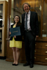 Ashley Cercone is congratulated by her advisor, Peter Biehl, for her achievements. Cercone was honored as the CAS Dean's Outstanding Senior, Lucia Maria Houpt Award winner, Undergraduate Professional Activities Award winner, and for receiving Honors in Anthropology.