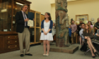 Dr. Peter Biehl, left, congratulates his advisee, Meghan Pavolosky, right, for receiving Honors in Anthropology.