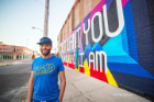  Artist Casey Milbrand in front of his I Just Want You to Know Who I Am Mural 982 Broadway St., Buffalo, N.Y. Scott Balzer photographer 