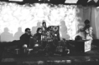 The Theater of Eternal Music, also known as The Dream Syndicate, performing at the Amagansett in Midsummer ‘66 festival. The multimedia ensemble, which featured a number of rotating members (including, from left in foreground, Terry Riley, Marian Zazeela, La Monte Young and Tony Conrad) focused on drone music—an experimental genre that was later popularized by Lou Reed and the Velvet Underground. Photo: Fredrick Eberstadt