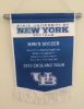 The team gave one of these banners, outlining the trip itinerary, to each club they played.