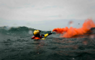 Rescue swimmers and aircrewmen from Coast Guard Air Station Cape Cod, Mass., conduct hoist training evolutions June 23, 2015. The MH-60 Jayhawk Helicopter pilots steadied the aircraft while the flight mechanics lowered and recovered the rescue swimmers to simulate recovering people in distress. (U.S. Coast Guard photo by Petty Officer 3rd Class Ross Ruddell)
