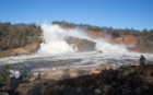 Spectators view water cascading into the Feather River from the damaged Oroville Dam spillway on Saturday afternoon in Butte County. Oroville Dam itself remains safe and there is no imminent threat to the public. Photo taken February 11, 2017. Dale Kolke / California Department of Water Resources, FOR EDITORIAL USE ONLY