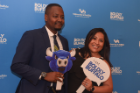Two UB alumni posing in the photo booth at the Boldly Buffalo event in NYC. 