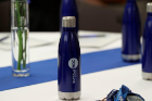 Buffalo EOC branded water bottle on table