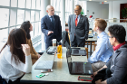 Alumni Gregg Fisher and President Satish K. Tripathi meet with students at the School of Management in March 2019. Photographer: Douglas Levere