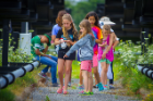 Campers take part in a nature-based scavenger hunt. Photo: Douglas Levere