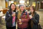 Sampling Frappuccinoes are, from left, exercise science students Vanessa Liang and Elizabeth Wendel, and chemistry major Jordianna D'Arrigo. Photo: Douglas Levere