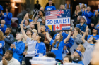 A fan celebrates the international flavor of the UB women's team. Players are from Australia, Bosnia & Herzegovina, the Netherlands and Canada, as well as the U.S. Photo: Paul Hokanson