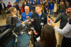 Bulls head coach Nate Oats meets with reporters this morning in Alumni Arena before the team departed for Providence, Rhode Island, for Thursday's first-round NCAA Tournament game. Photo: Douglas Levere