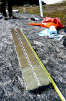 The sediment core used in the new study led by Elizabeth Thomas. The column, collected from a lake bottom in western Greenland, contains aquatic leaf waxes that reveal information about the history of precipitation at the site. Photo: Jason Briner