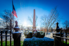 A granite obelisk marks the gravesite of Millard Fillmore and his family in Forest Lawn Cemetery. Photo: Douglas Levere