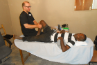 Physical therapist Rich McCarthy helps a patient with a musculoskeletal problem.