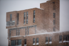 Blowing snow buffets the Ellicott Complex.