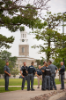Hayes Hall provides the backdrop as police officers await instructions.