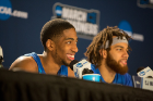 Junior guards CJ Massinburg (left) and Jeremy Harris take questions at the post-game press conference.