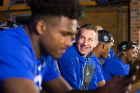 Coach Nate Oats, surrounded by his players, is anxious to find out where the Bulls will play.