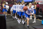 Freshman guard Hanna Hall leads the Bulls onto the court for their second-round game against Florida State.