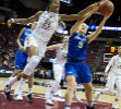 Florida State center Ama Degbeon and UB guard Katherine Ups battle for a rebound.