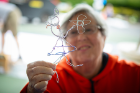 Linda Zolet, visiting from Florida, creates a wire sculpture.