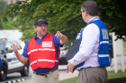 Jay Roorbach (red vest), senior emergency planning coordinator, gives directions during the Aug. 1 drill.
