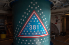 An emblem signifies the 381st flight of the United Launch Alliance Delta family on the Delta II rocket with NASA's ICESat-2 on board. The first Delta I was launched in May 1960. A star traditionally was placed on the rocket to recognize each mission. The final Delta II boasts more than 150 stars with over 800 signatures of people who have been part of the Delta II program. Photo Credit: (NASA/Bill Ingalls)
