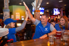 A future Bull shares a high-five at Santora's Pizza Pub & Grill. Photo: Meredith Forrest Kulwicki