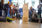 Giant Jenga requires nerve, strategy and steady hands. Photo: Douglas Levere