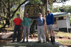UB-affiliated mountain climbers (from left) Jim Eaton, Bill Sullivan, John Sexton and Scott Weber pose for a picture at the Machame Gate, the starting point for many treks up Mount Kilimanjaro.