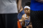 Cierra Dillard listens to her coaches on the bench.