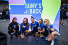Members of the UB women's volleyball team take part in the event.