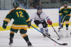UB's Frangelica Bautz tries to gain possession of the puck during a game against Oswego.