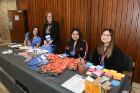 Volunteers, including many tech professionals, made the event possible, assisting with everything from registration to demos. From left: UB student Gianna Damico; Amanda Dzierzanowski, Girl Scouts of WNY; and UB students Ishana Pandit and Elaine Liu. 