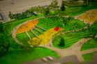 The playgarden area will be located on the other side of the I-190, connected by bridge to the rest of the park.
