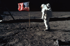 Astronaut Buzz Aldrin poses for a photograph beside the United States flag on the lunar surface. The astronauts’ footprints are clearly visible. Photo: NASA
