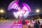 Students wait to ride an amusement ride at First Night Fun on Friday night. Photo: Douglas Levere
