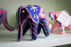 Stitch Buffalo’s refugee artisans hand-embroider elephants to symbolize success, wisdom and companionship. All items are available for sale at the organization’s storefront at 1215 Niagara St., Buffalo, and at their online Etsy store. 