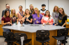 Jeff Yap's science class at Williamsville South High School. Front row, from left: Nina Pace, Amy Bieber, Isa Rizzo, Allison Jeffords, Lucia Palladino and Jenna Palladino. Back row, from left: UB chemistry professor Jason Benedict, Jeff Yap, WIVB-TV reporter Kelsey Anderson, Jibran Ahmad and Brianna Barbalato