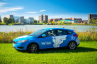 University Communications collaborated with Parking and Transportation to develop the distinctive look of the UB-branded Zip car. Photo: Douglas Levere