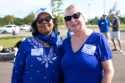 Kamlesh Tripathi (left) and Jo Ann Weber, the wives of President Satish K. Tripathi and Interim Provost A. Scott Weber, joined the fun at the pre-game festivities. Photo: Meredith Forrest Kulwicki