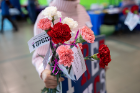 Flowers were passed out to bystanders, courtesy of the UB Men's Group, a group of UB men who are active in preventing violence against women. The flowers featured cards that outlined the definition of "consent."