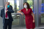 Lt. Gov. Kathy Hochul exchanges an "elbow bump" with infectious disease expert Thomas Russo.