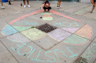 The students worked together to create a large heart chalk drawing on the sidewalk near the Student Union. It read: "Justice for Vanessa."