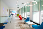 The Bruce A. Holm Commons area features colorful and distinctive seating. Photo: Douglas Levere