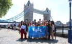 UB students gathered in front of one of the many iconic bridges in London, England during this year's SLIDE trip.