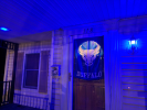 A front porch glowing with #UBTrueBlue pride!