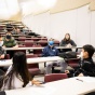 Image of a group of students in a UB classroom. 