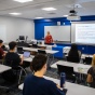 Dillon Benedicto leads a knife safety class with Danielle Meyer, with the department of exercise and nutrition sciences, in Farber Hall in September 2021. 