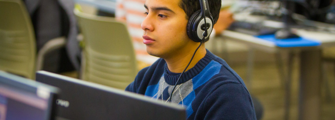 Student working at a computer. 